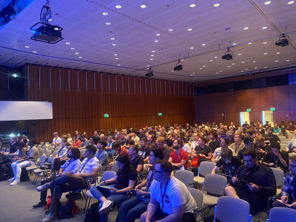 Crowd during Marie Mejerwall's talk 'The Building Blocks of Gameplay' at DevCom 2023